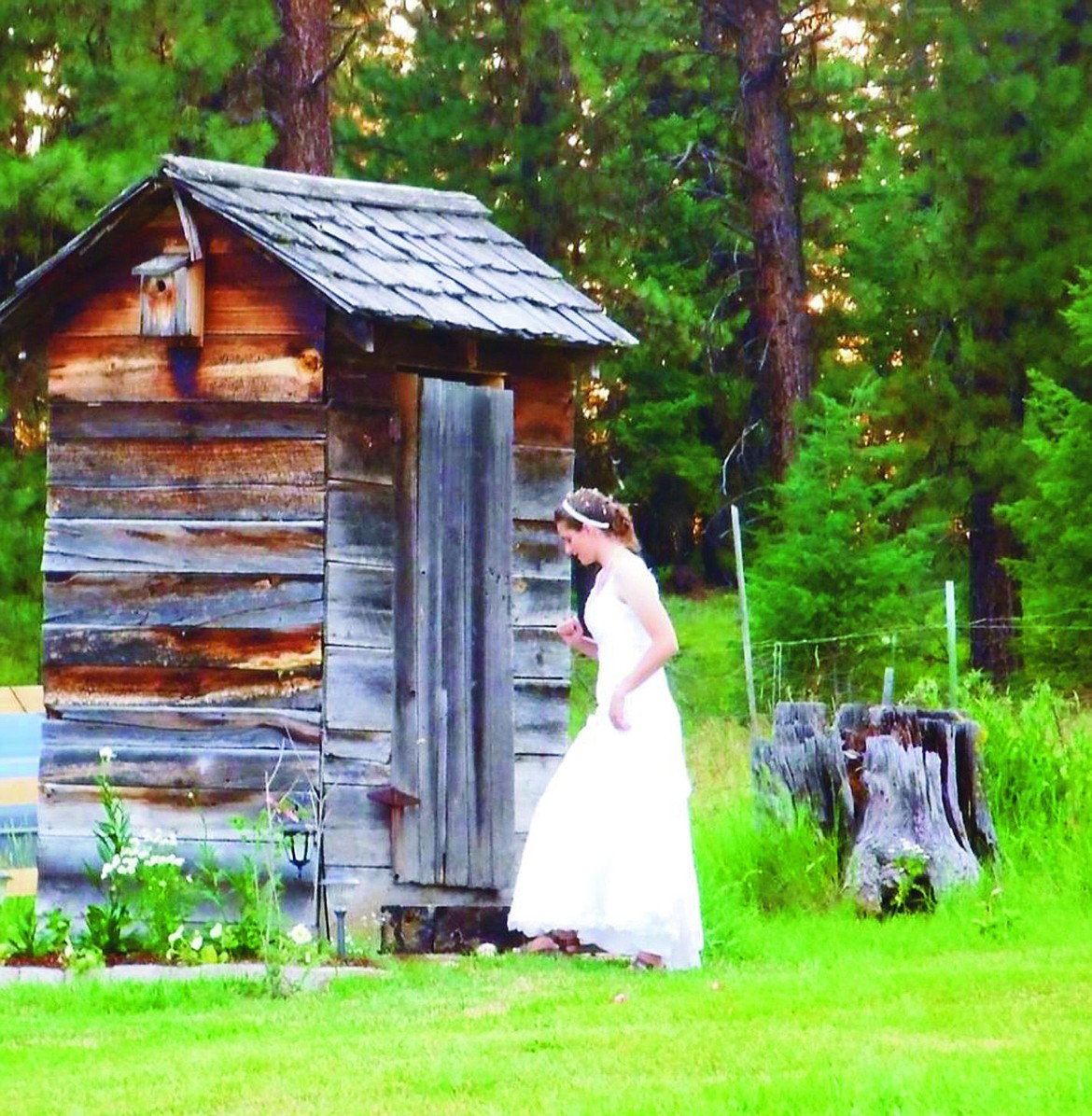 &lt;p&gt;Katie Petteys steps into the original outhouse at the Stobie Ranch. The ranch does not have electricity or running water.&lt;/p&gt;