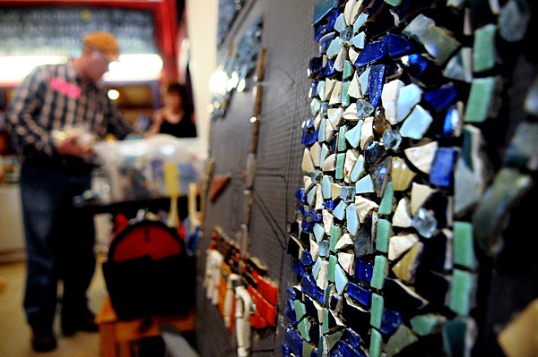 &lt;p&gt;Detail of one of the forthcoming Windows on Whitefish mosaics. In the background participants in Deb Stika's class comb through bins of broken tile to use in their mosaic projects.&lt;/p&gt;