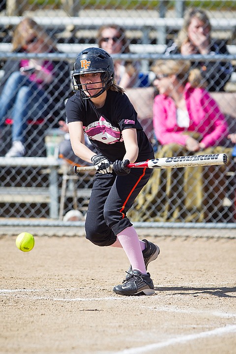 &lt;p&gt;Katie King attempts a swinging bunt in the seventh inning for Post Falls.&lt;/p&gt;