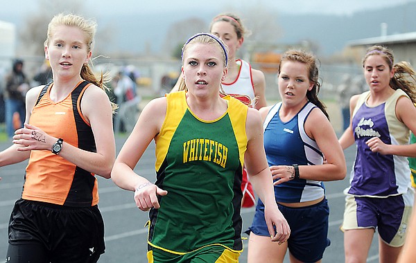 Jessica Sagen of Whitefish and others running in the 3200 meters on Saturday at the Archie Roe Track and Field Invitational in Kalispell.