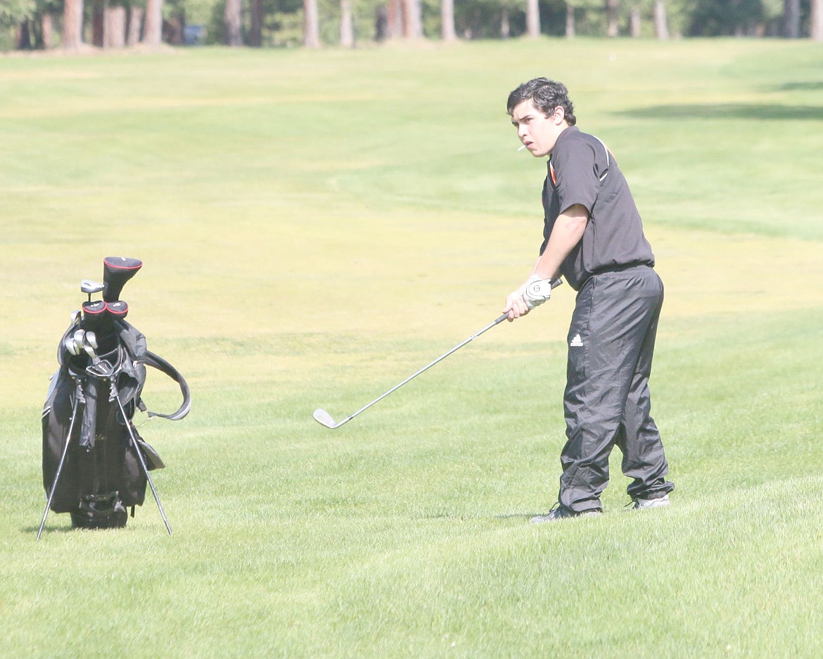 &lt;p&gt;Fame Lopez chips onto the green during the tournament at Trestle Creek.&lt;/p&gt;