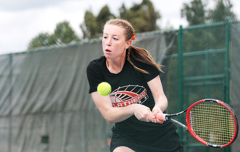 &lt;p&gt;Flathead's Jenna Jensen smashes a return in her Northern AA semifinal match against Lucia Barbeito at Flathead Valley Community College on Friday. (Aaric Bryan/Daily Inter Lake)&lt;/p&gt;