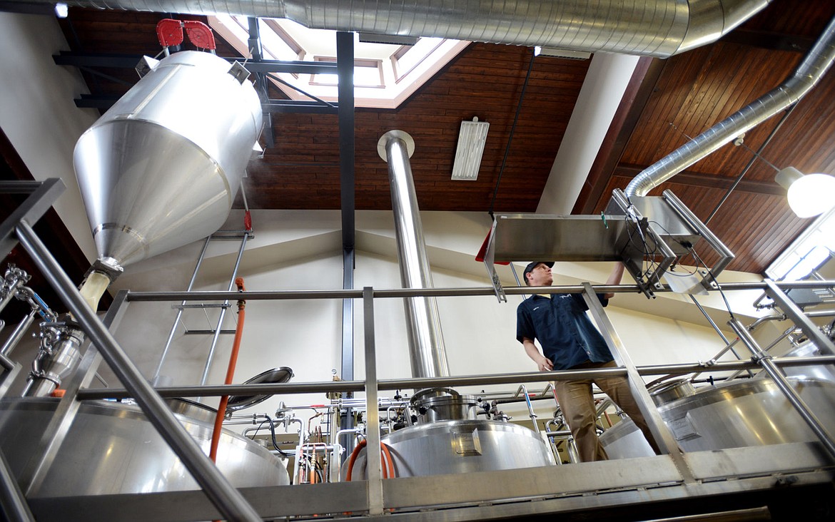 &lt;p&gt;David Brendgard brews the new Lone Walker Ale on Thursday, April 28, at Flathead Lake Brewing Company in Bigfork. The beer will be available this summer at the Flathead Lake Brewing Company and as a draft beer at the lodges in Glacier National Park. (Brenda Ahearn/Daily Inter Lake)&lt;/p&gt;