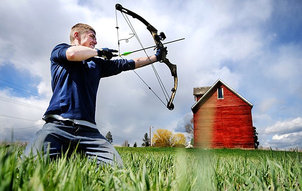 Marc Hardesty of Kalispell practices shooting in the 40 foot range with his Browning Compound Bow on Friday afternoon. Hardesty is working to improve his skills in anticipation of Elk season which will begin on September 4 for bow hunters. This will be his first year bow hunting.