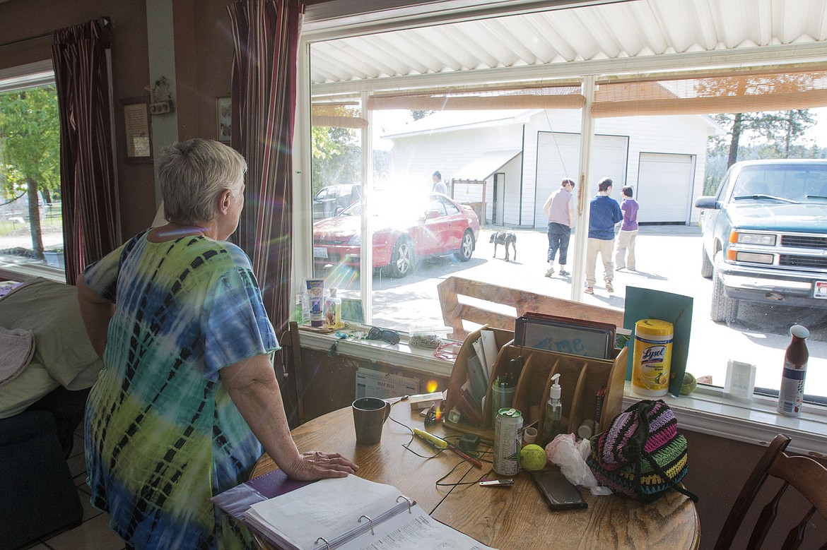 &lt;p&gt;Jana Tritto watches as her kids go out for a walk during their down time.&lt;/p&gt;