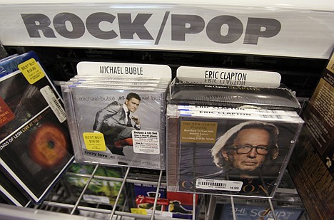 &lt;p&gt;CDs by musicians Eric Clapton, right, and Michael Buble, left, on display at Best Buy in Mountain View, Calif., Friday.&lt;/p&gt;