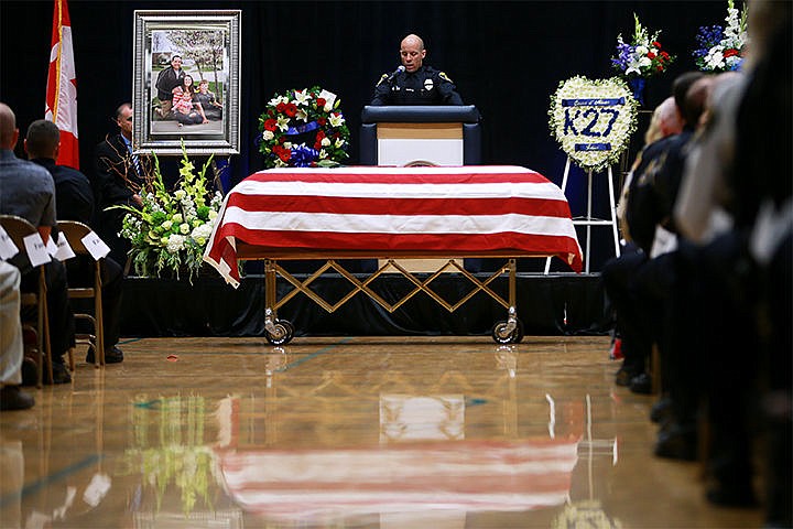 &lt;p&gt;Detective Johann Schmitz was a speaker at the funeral of Sgt. Greg Moore on Saturday at Lake City High School. Schmitz was a dear friend and colleague of Moore&#146;s.&lt;/p&gt;