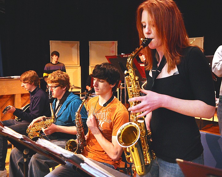 Columbia Falls senior Laura Burgess plays the saxophone with the Columbians during practice on Tuesday. Burgess plans to pursue a minor in music at the University of Mary.