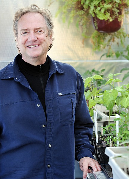 Michael Smith, president of Algae Aqua-Culture Technologies in the greenhouse at Stoltze Lumber Company on Friday in Columbia Falls.