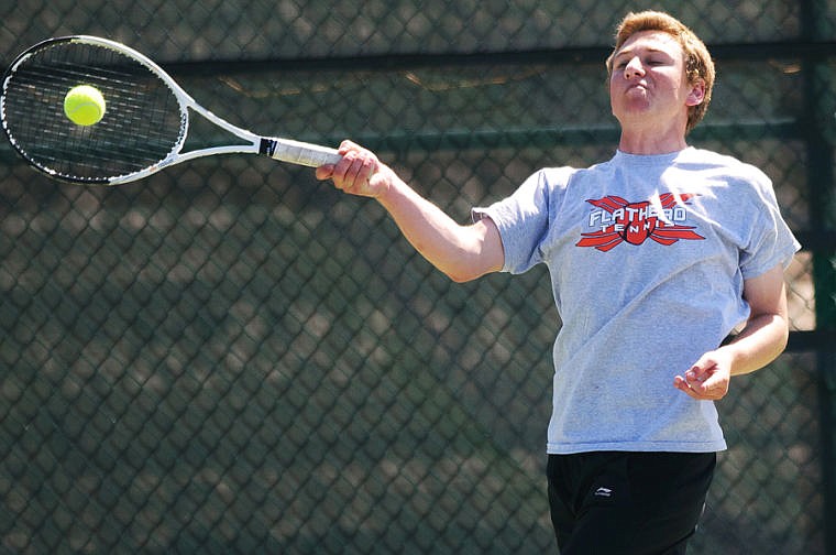 &lt;p&gt;Flathead's Matt Widen returns a serve Thursday afternoon during the Class AA Northern divisional tennis tournament at Flathead Valley Community College.&lt;/p&gt;