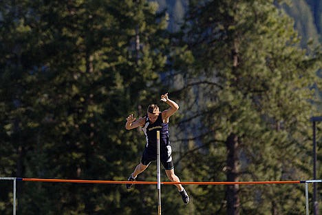 &lt;p&gt;Timberlake High School senior Tyler Badertscher clears the 12-foot mark during the boys pole vault event at the 3A District 1 track and field meet Friday in Spirt Lake.&lt;/p&gt;