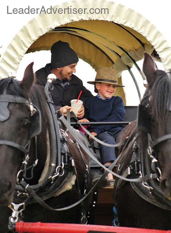 &lt;p&gt;Marvin Troyer of St. Ignatius gives his son Timothy, 5, a ride during Saturday's living history tour at Fort Connah Restoration Society's tribute to George Knabb.&#160;&lt;/p&gt;