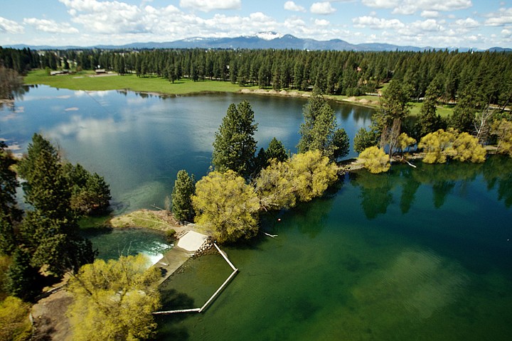 &lt;p&gt;Flood waters flow over the spillway Monday as the adjacent property is submerged with the water from Hayden Lake.&lt;/p&gt;