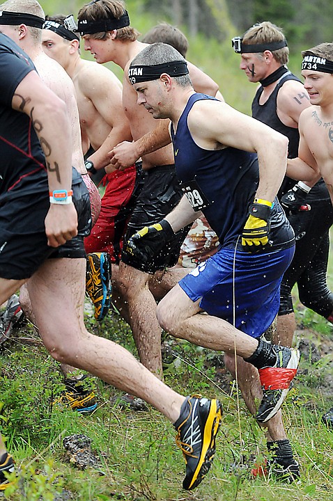 <p>Members of the Men's Elite Class start the Montana Spartan Sprint Race on Saturday, May 10, in Bigfork. The winner of the race was Matt Novakovich of Anchorage, Alaska. (Brenda Ahearn/Daily Inter Lake)</p>