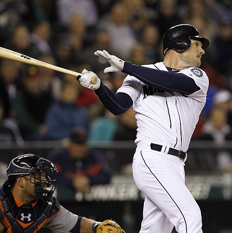 &lt;p&gt;Seattle Mariners' John Jaso singles in a run as Detroit Tigers catcher Gerald Laird looks on in the eighth inning of a baseball game Wednesday, May 9, 2012, in Seattle. (AP Photo/Elaine Thompson)&lt;/p&gt;