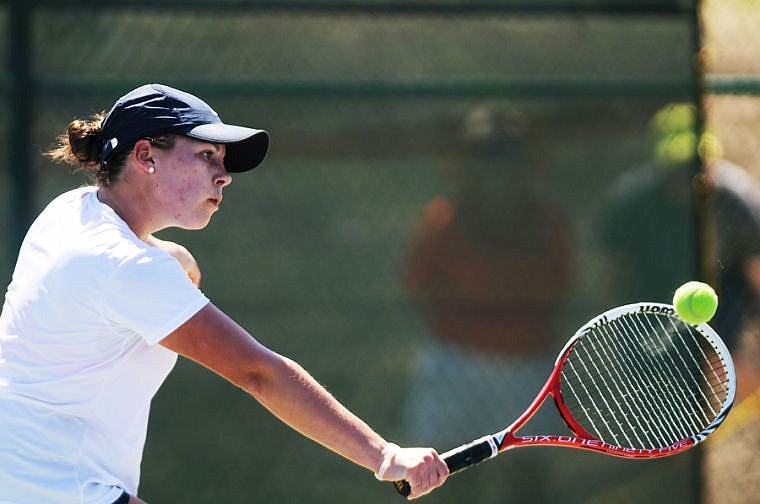 &lt;p&gt;Glacier&#146;s Katya Kulikova hits a backhand during Friday&#146;s singles championship match at the Northern AA divisional tennis tournament at Flathead Valley Community College.&#160;&lt;/p&gt;