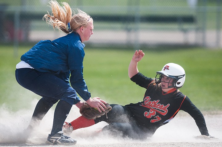 &lt;p&gt;Flathead&#146;s Kaylee Henderson (37) slides safely to third base Thursday afternoon during the first game of the crosstown doubleheader with Glacier at Kidsports Complex.&lt;/p&gt;