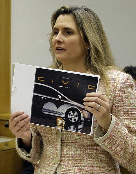 &lt;p&gt;FILE - In this Tuesday, Jan. 3, 2012 file photo, Heather Peters, who said her 2006 Honda Civic Hybrid never achieved the gas mileage Honda claimed in its advertising, pleads her case in Small Claims Court in Torrance, Calif. A Los Angeles County judge has overturned a nearly $10,000 small-claims judgment against American Honda Motor Co. that was won by Peters who said the automaker misrepresented the gas mileage of her hybrid Civic. Superior Court Judge Dudley W. Gray's ruling released Wednesday May 9,2012 found that most owners of that type of car achieve fuel economy close to federal EPA estimates. A court commissioner had previously ruled in favor of Peters, awarding her $9,867. (AP Photo/Reed Saxon, File)&lt;/p&gt;