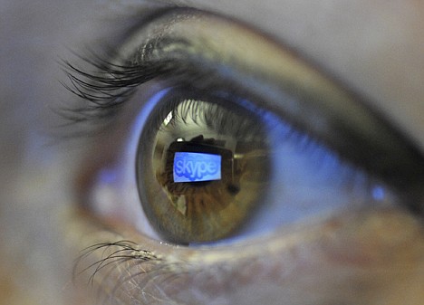 &lt;p&gt;In this Jan. 11 file photo, the Skype logo is reflected in the eye of a reader using a handheld smartphone, in Berlin, Germany. Microsoft Corp. is nearing a deal to buy the popular Internet telephone service Skype in what could be the biggest deal in the software maker's 36-year history, according to a published report Tuesday.&lt;/p&gt;