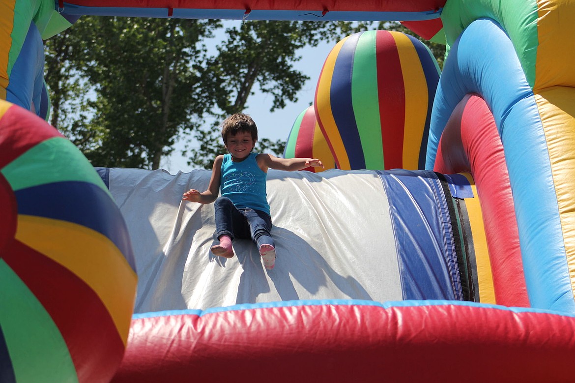 &lt;p&gt;Marley Fredette from Alberton has a good time on the inflatable slide at Little League opening ceremonies in Frenchtown last Saturday&lt;/p&gt;