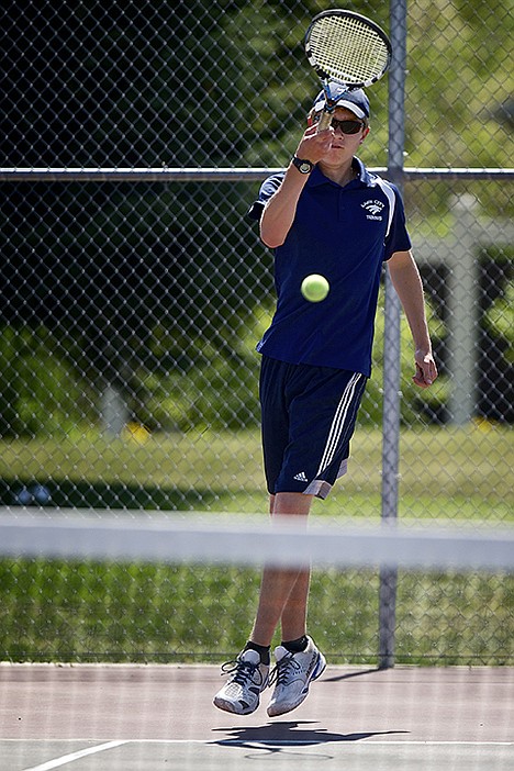 &lt;p&gt;Lake City High's Jordan Cates returns a serve during his boys singles match Friday in the 5A Region 1 tournament at Lake City High School.&lt;/p&gt;