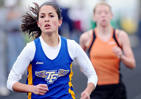 Thompson Falls' Beca Gunderson competes in the girls 3200 at the Archie Roe Track Meet on Saturday in Kalispell. Gunderson finished with a time of 13.23.63.