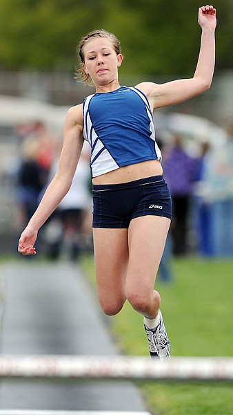 Glacier's Lexi Boschee competes in the long jump at the Archie Roe Track Meet on Saturday in Kalispell.