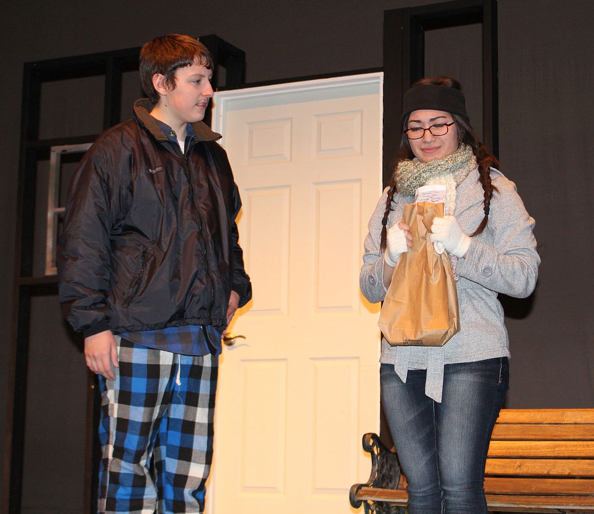 Glory (Cynthia Urena) holds tight to the pieces of her broken heart, getting a sympathetic hearing from East (Trevor Fuller) in the Moses Lake High School production of &#145;Almost, Maine,&#148; opening Thursday.
