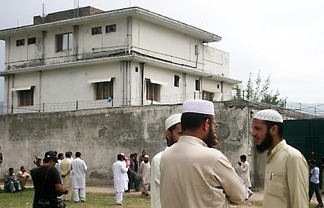 &lt;p&gt;Residents and reporters stand outside the house where al-Qaida leader Osama bin Laden was caught and killed bu U.S. forces in Abbottabad, Pakistan.&lt;/p&gt;