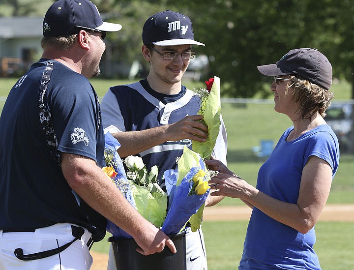 &lt;p&gt;Mo Hoyt gives his mom flowers before the start of the Mariners second game on Sunday. All the players from both teams gave all the mothers in attendance flowers for Mother's Day.&lt;/p&gt;