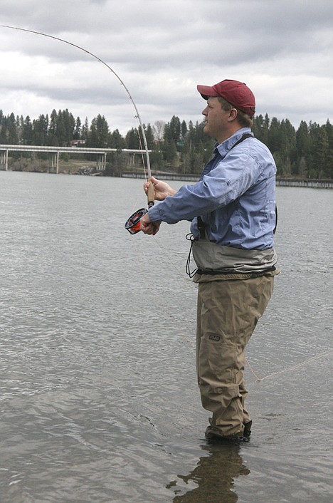 <p>Rial Blaine, manager and head guide at Castaway Fly Shop, wields a spey rod on the Spokane River last week. Blaine and other Castaway experts are hosting fly-casting clinics on Tuesday nights.</p>