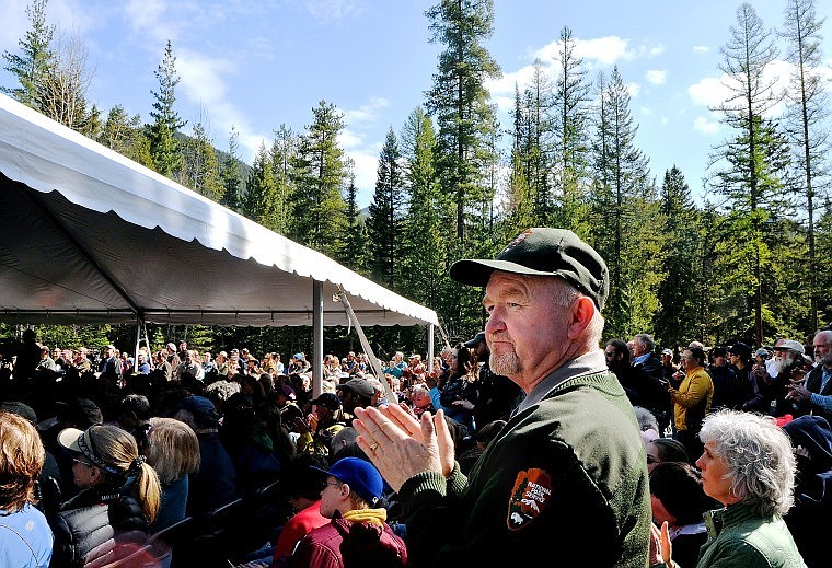 Pat Thomas, a National Park Service landscape architect, claps along with approximately 1,000 attendees during Glacier Park&#146;s centennial birthday celebration on Tuesday.