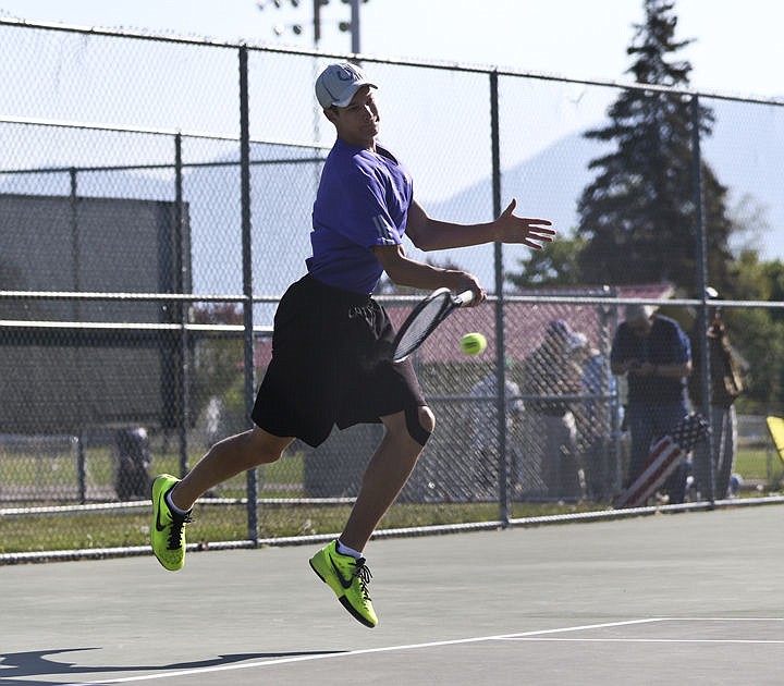 &lt;p&gt;Matt Sitter returns a serve during a doubles match against Stevensville Saturday morning.&lt;/p&gt;