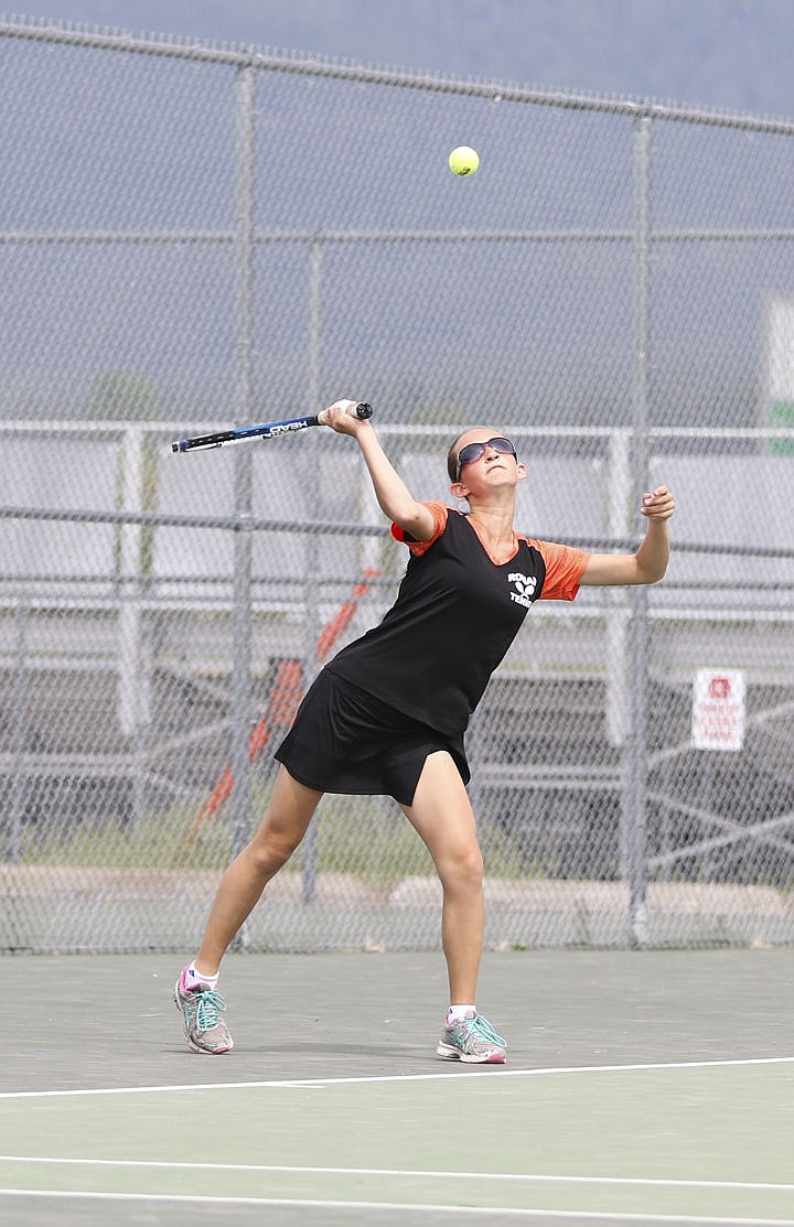 &lt;p&gt;Ronan's Morgan Brooks serves during her singles match in Ronan Thursday.&lt;/p&gt;