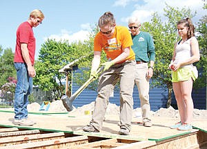 &lt;p&gt;Habitat for Humanity house with Dejon Raines at the sledge hammer.&lt;/p&gt;