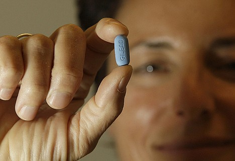 &lt;p&gt;Dr. Lisa Sterman holds up a Truvada pill Thursday at her office in San Francisco. Sterman prescribes the drug off-label for about a dozen patients at high risk for developing AIDS. The pill, already used to treat people with HIV, also helps prevent the virus from infecting healthy people.&lt;/p&gt;