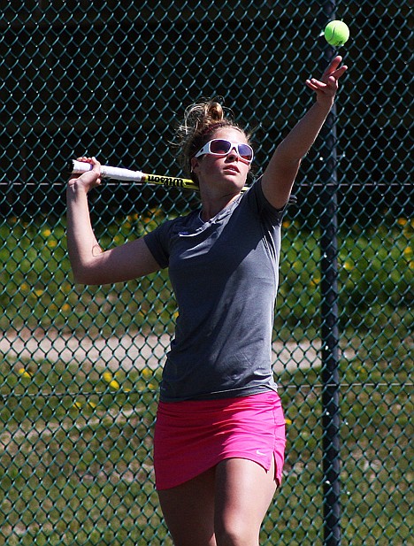 &lt;p&gt;Sandpoint senior Courtney Windju and the Bulldogs dominated the 4A Region 1 tennis meet on Saturday at Travers Park in Sandpoint.&lt;/p&gt;