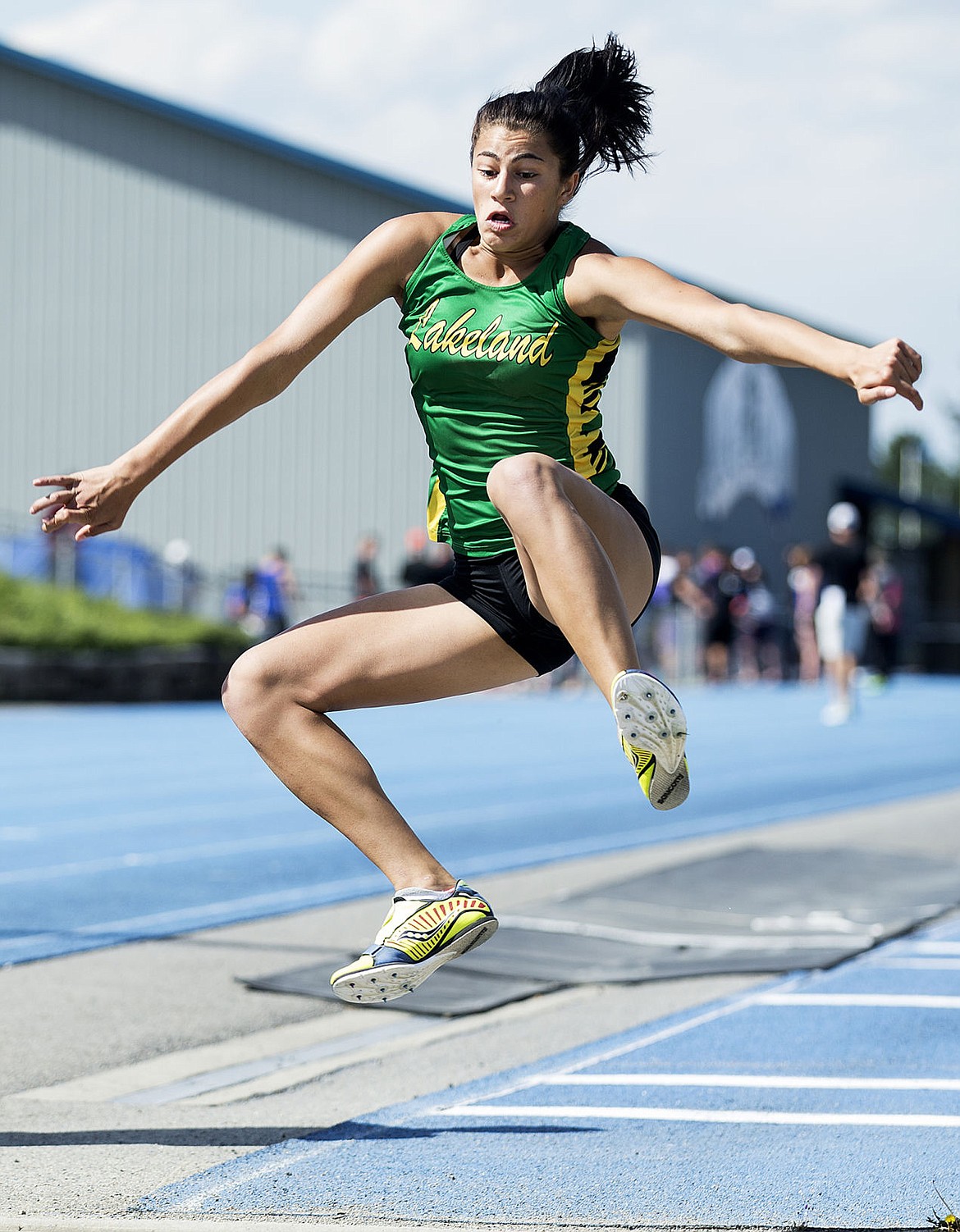 <p>LOREN BENOIT/Press Lakeland's Whitnee Skalisky leaps with a triple jump distance of 37 feet 8 inches during the 5A and 4A Region 1 track meet on Thursday at Coeur d'Alene High School. Skalisky placed first in the event.</p>
