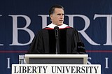 Romney urges grads to honor family commitments