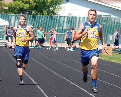 &lt;p&gt;Dominic Voorhies, left and Logan Nelson running the 200 meter, Archie Roe track meet May 17, 2016.&lt;/p&gt;