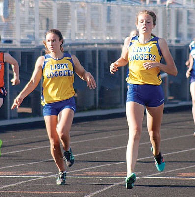 &lt;p&gt;Sidney Stevenson, left and Emily Mossburg running the 200, Archie Roe track meet.&lt;/p&gt;