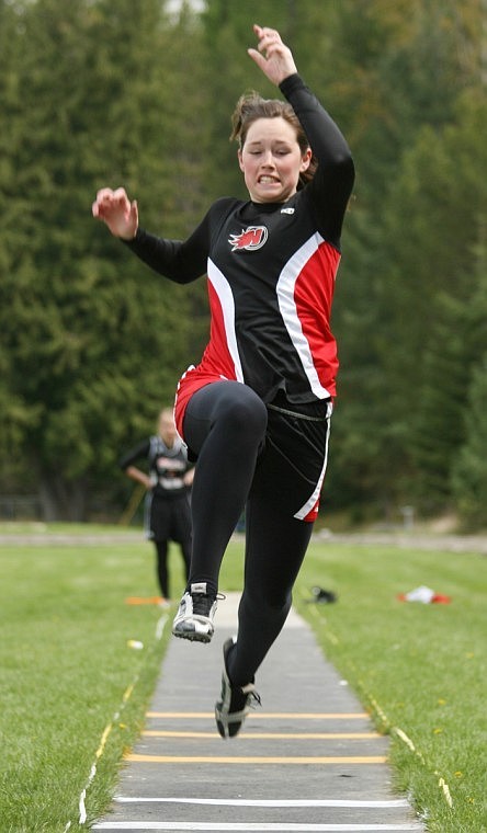 Randi Arnold soars in the long jump at Noxon on Thursday.