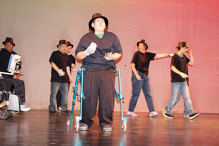 Brandon Torres gets down to the &quot;Beat It&quot; beat at the Pals Club talent show recently. The Pals Club members pick the numbers and practice for about four months.