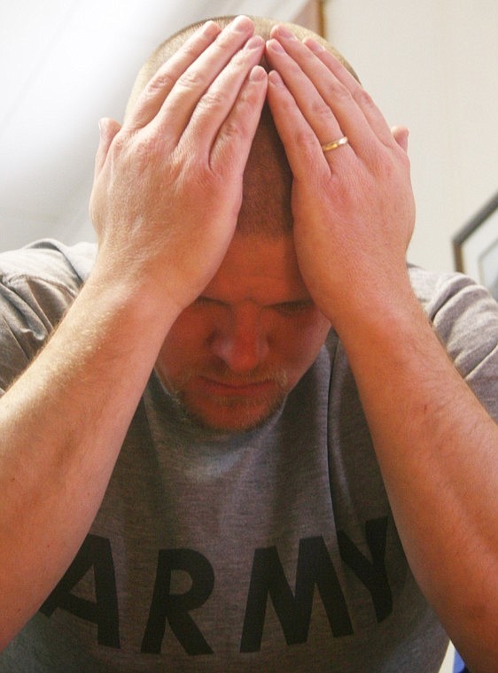 Associate Pastor John Curry of Plains Alliance Church prays during the National Day of Prayer at Plains City Hall