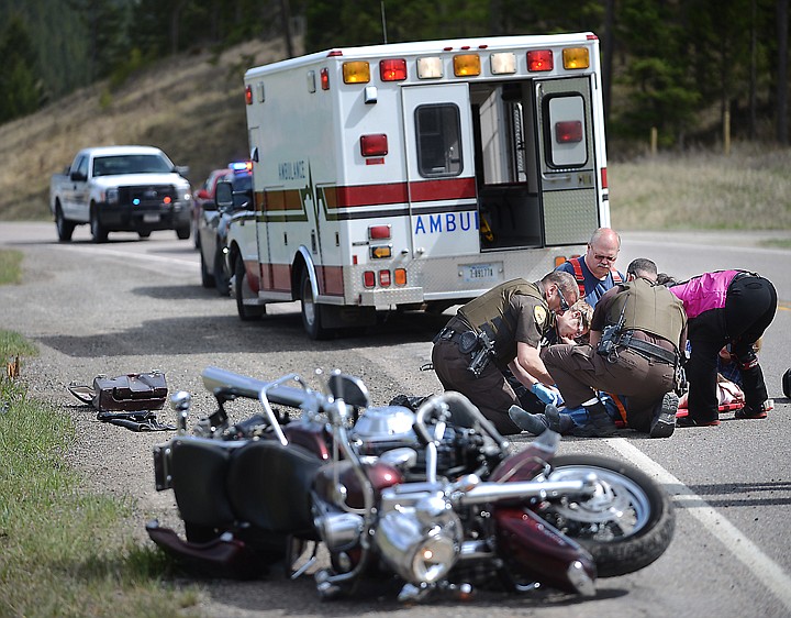 &lt;p&gt;First responders from the Smith Valley Fire Department, West Flathead EMS, Flathead Sheriff's Office and the Montana Highway Patrol respond to the scene of a motorcycle wreck on Foys Canyon Road near Orchard Ridge Road. (Brenda Ahearn/Daily Inter Lake)&lt;/p&gt;