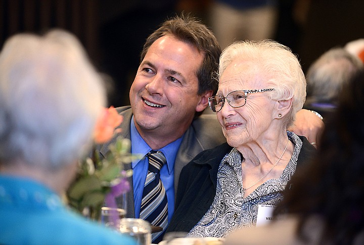 &lt;p&gt;Centenarian Velma Bradley smiles as she receives her honorary plaque from Governor Steve Bullock at the Montana Department of Public Health and Human Services luncheon honoring Montana Centenarians on Tuesday, May 6, in Kalispell. (Brenda Ahearn/Daily Inter Lake)&lt;/p&gt;