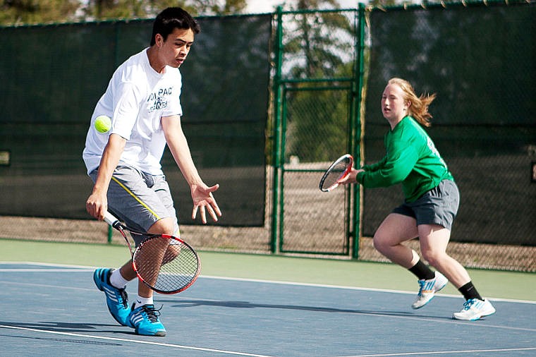 &lt;p&gt;Glacier's Hunter Blaylock (left) returns a volley during a mixed-doubles match with his partner Kali Matheson Tuesday afternoon during a crosstown tennis match at Flathead Valley Community College. May 6, 2014 in Kalispell, Montana. (Patrick Cote/Daily Inter Lake)&lt;/p&gt;