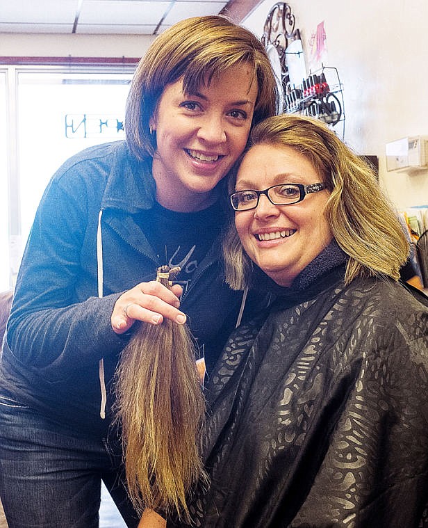 &lt;p&gt;Vivian Gelormino, right, had 11 inches of hair cut off Monday afternoon at Crevier's School of Cosmetology in Kalispell. Gelormino raised $11,000 for her friend Sarah Lynch, left, who has a rare tumor-producing disorder, by pledging to cut one inch of hair for every $1,000 dollars raised. Dontations can still be made at http://welovesarahlynch.wix.com/sarah. May 5, 2014 in Kalispell, Montana. (Patrick Cote/Daily Inter Lake)&lt;/p&gt;