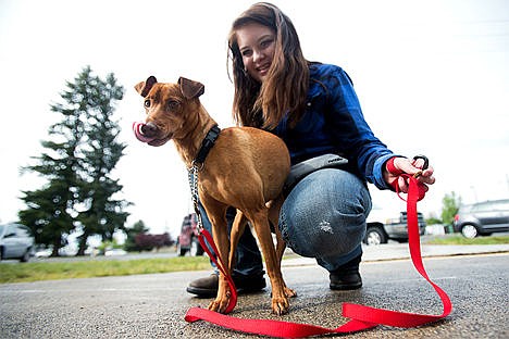 &lt;p&gt;New Vision High School Student Anna Rosa, 16, walks Cash, a miniature pinscher from the Kootenai Humane Society on Wednesday afternoon. The two were paired to extend their training skills and are apart of a program called Pawsitive Works.&lt;/p&gt;