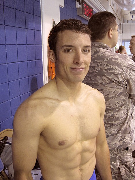 &lt;p&gt;Air Force Staff Sgt. Marc Esposito, 26, smiles after he finished first in a preliminary heat in the 50-meter freestyle at the Warrior Games in Colorado Springs, Colo., on Wednesday. Esposito, a Special Operations combat controller, suffered a broken back, a moderate traumatic brain injury and severe injuries to his lower legs from an improvised explosive device in Afghanistan in May 2009.&lt;/p&gt;